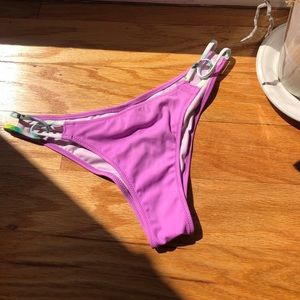 Victoria’s Secret: purple swim bottoms